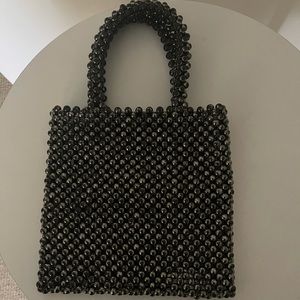Beaded mini bag.